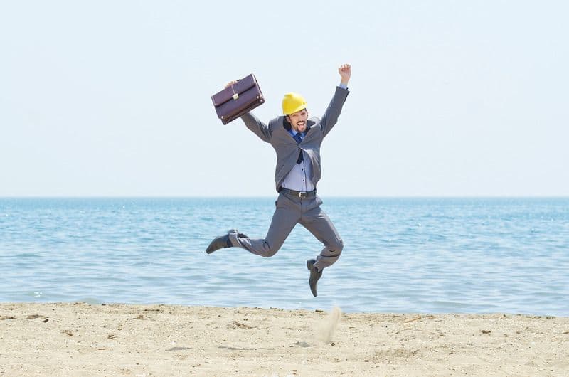 Bathroom Contractor Jumping with Briefcase